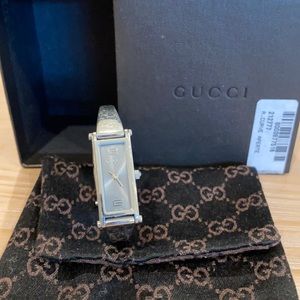 Gucci 1500L Swiss made, stainless steel gray watch